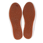 White sneakers with brown textured insoles and full-length inner sole