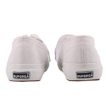 White sneakers, rear view with padded collar and heel tab branding patch