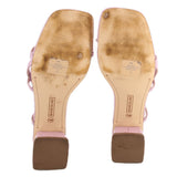 Patent heeled sandals showing insoles and rubber soles; ankle straps attached