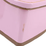 Patent upper close-up with stitched seams and glossy light purple finish
