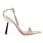 Gold metallic heeled sandal with rhinestone-trimmed V-strap and slim heel