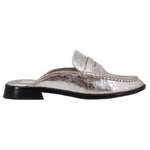 Silver metallic mule loafers, side view with instep strap and black outsole heel