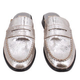 Pair of silver metallic mule loafers, front view with two strap bands and moc stitching
