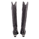 Pair of black cowboy boots, rear view with tall shaft and stacked heel