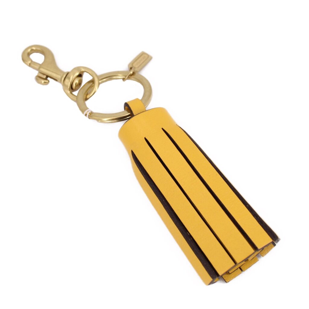 COACH mustard tassel bag charm keychain with metal ring and clasp