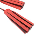 Red leather tassel fringe detail with black-trimmed stripes