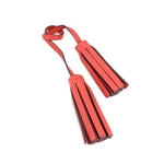 COACH red leather tassel accessory with striped fringe and loop strap