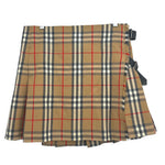 Burberry plaid skirt in tan with red and dark lines; side buckles, layered hem