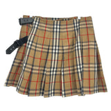 Plaid skirt in tan, red, and dark with front pleats and adjustable side straps