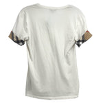 White short-sleeve top with plaid cuff trim on the sleeves