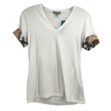 White V-neck top with short sleeves and plaid cuff trim