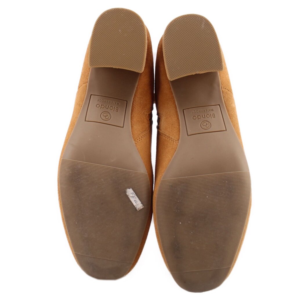 Tan suede waterproof boot outsoles with textured tread and cushioned lining