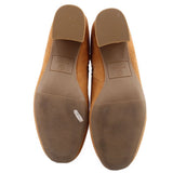 Tan suede waterproof boot outsoles with textured tread and cushioned lining