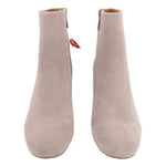 Pair of waterproof suede ankle booties, gray, side zipper