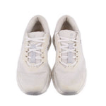 Pair of white lace-up ON Cloudrunner 3 sneakers with breathable mesh panels
