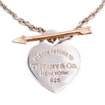 Heart pendant with Tiffany & Co. 925 engraving and rose-gold arrow bar charm
