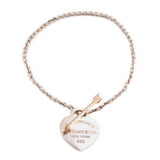 Tiffany & Co. heart charm bracelet with rose-gold arrow accents and 925 tag