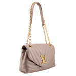 Taupe quilted shoulder bag with curved flap and gold chain strap, logo front clasp