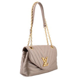 Taupe quilted shoulder bag with curved flap and gold chain strap, logo front clasp