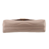 Taupe shoulder bag showing top edge and stitched flap seam, without chain