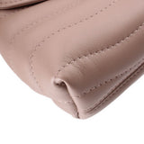 Taupe bag bottom corner with seam stitching and rounded folded edge