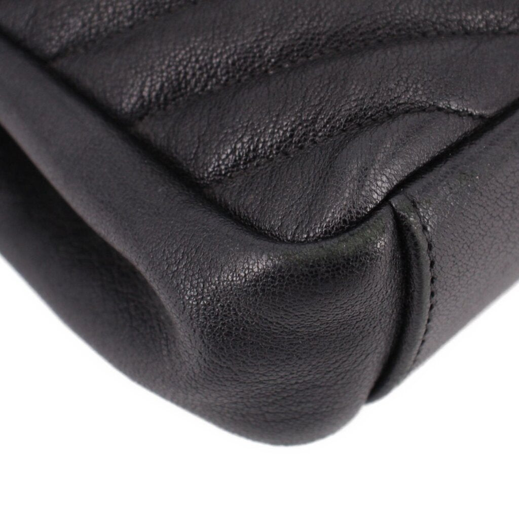 SAINT LAURENT black leather crossbody bag corner with curved padded quilting