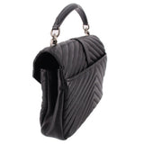 SAINT LAURENT quilted black medium crossbody bag side view with chain strap and flap
