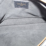 LOUIS VUITTON black fabric lining with brand label inside pouch