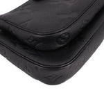 LOUIS VUITTON black embossed leather flap detail with curved seam and stitching