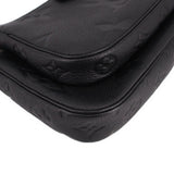 LOUIS VUITTON black embossed leather flap detail with curved seam and stitching