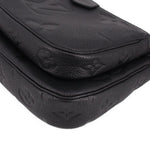LOUIS VUITTON black embossed leather flap corner with rounded seam and stitching