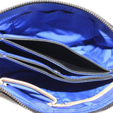 Black quilted bag interior with blue fabric lining and zipper-top opening