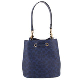 COACH ROWAN blue bucket crossbody bag with top handles, drawstring grommets, gold trim