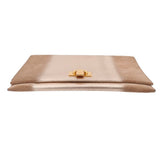 Tan foldover clutch with gold-tone top clasp and folded flap.