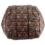 Floral quilted tote bag with stitched grid panels and padded exterior
