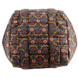 Floral quilted tote bag with stitched grid panels and padded exterior