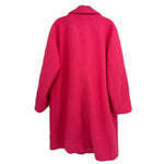 Back view of pink double-breasted wool coat with long sleeves and center vent