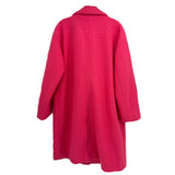 Back view of pink double-breasted wool coat with long sleeves and center vent