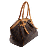 LOUIS VUITTON Tivoli GM monogram tote bag angled view with leather top handles