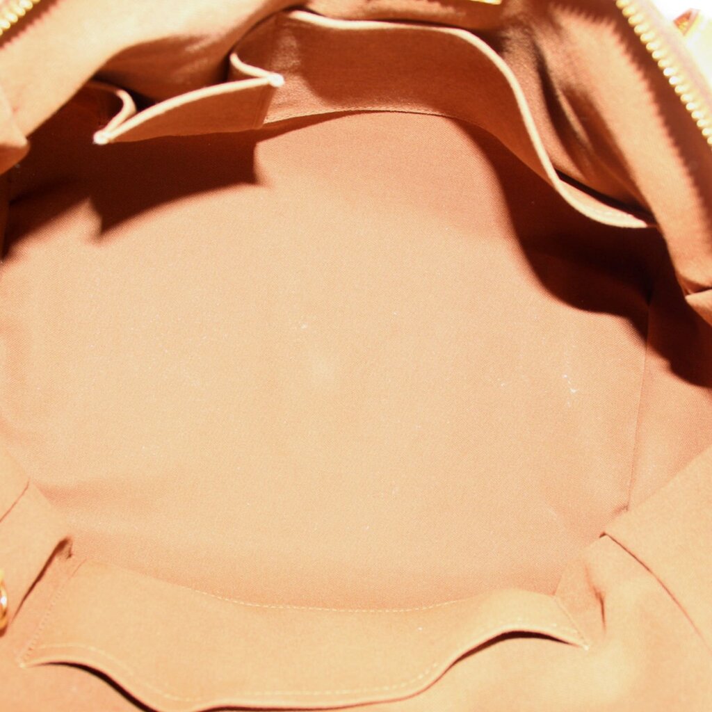LOUIS VUITTON Tivoli GM monogram bag interior view with tan fabric lining
