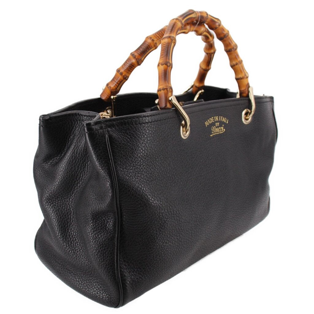 Black Gucci bamboo-handled shopper tote, side view with gold hardware