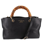 Black Gucci bamboo-handled shopper tote with gold-tone ring top handles