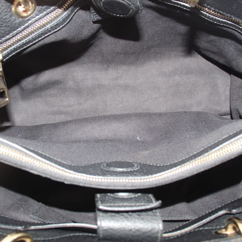 Black Gucci shopper tote interior lining with zipper and center strap tab