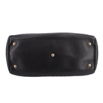 Black Gucci shopper tote with studded base feet and gold-tone hardware