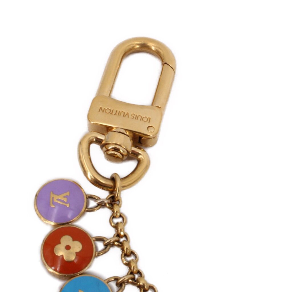 Gold padlock clasp keychain with dangling multi-color enamel coin charms