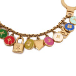 Gold chain keychain with multicolor enamel heart and flower-shaped charms