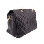CHANEL grand shopper tote bag, dark quilted leather with stitched logo and gold hardware