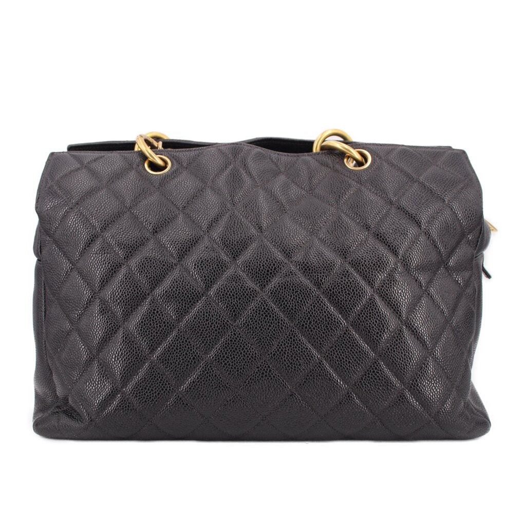 CHANEL grand shopper tote bag in dark quilted leather with double ring top handles