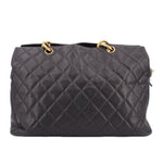 CHANEL grand shopper tote bag in dark quilted leather with double ring top handles