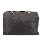 CHANEL grand shopper tote bag in dark quilted leather with double ring top handles